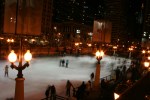 A picture of blurred skaters at the Millenium Park ice rink.