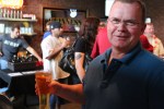 A Scotty's Brewhouse VIP shows off his beer.